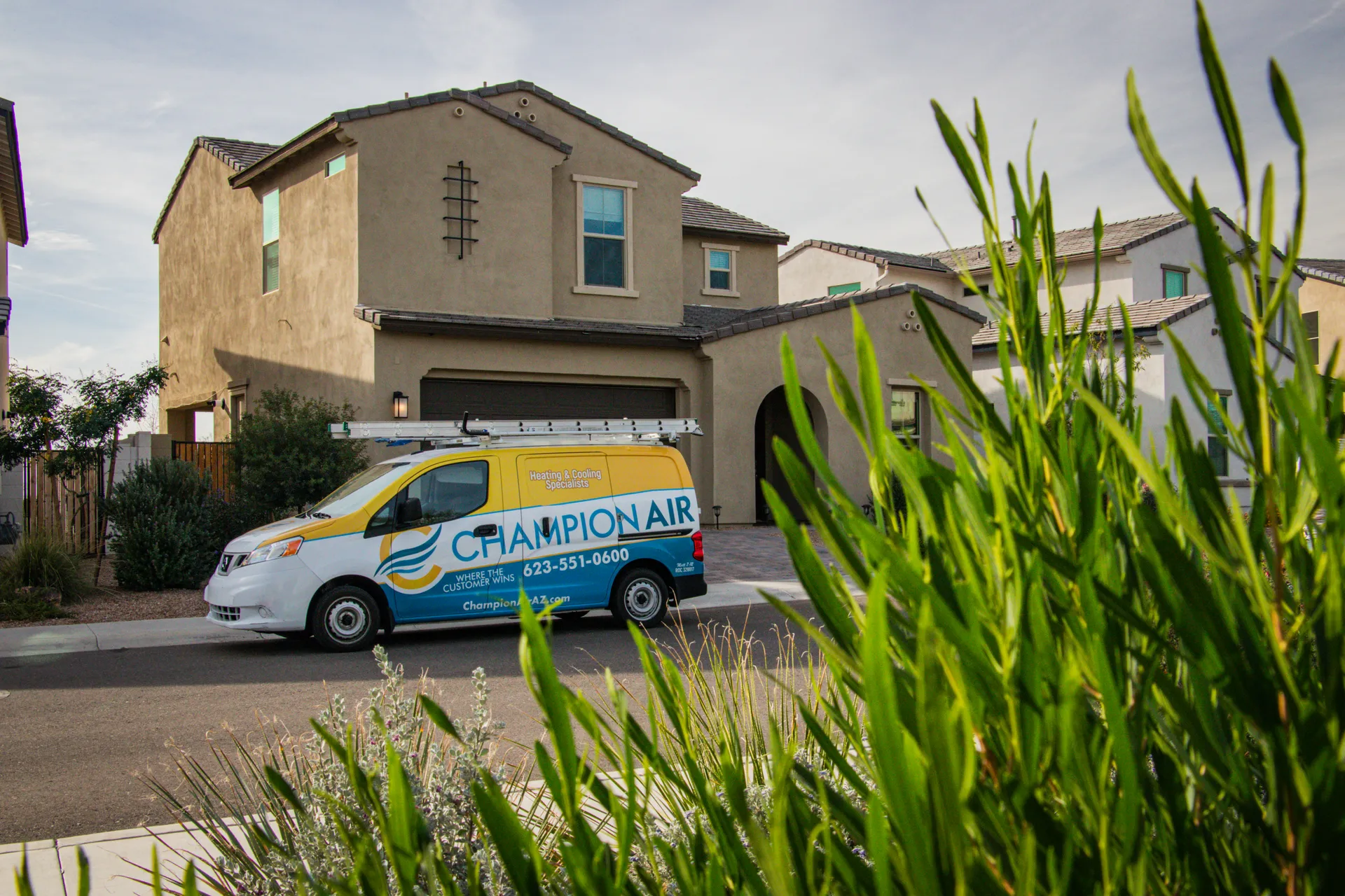 Champion Air service van at a customer's home