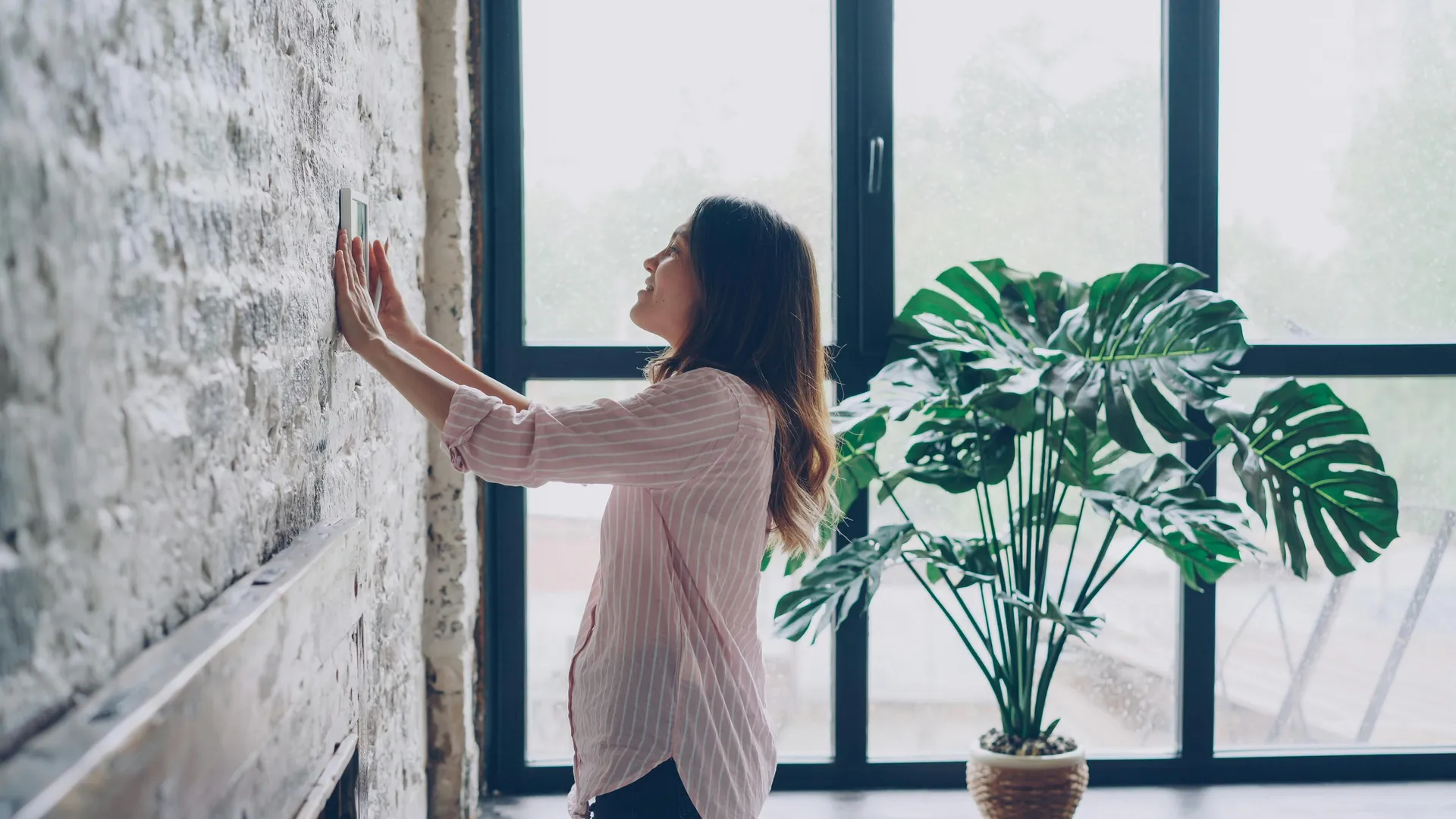 homeowner inspecting a digital thermostat in a modern Scottsdale home - heat pump troubleshooting tips before calling a pro homeowner inspecting a digital thermostat in a modern Scottsdale home - heat pump troubleshooting tips before calling a pro