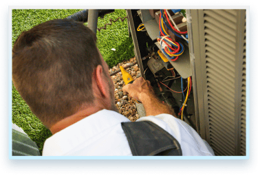 Champion Air servicing an air conditioner