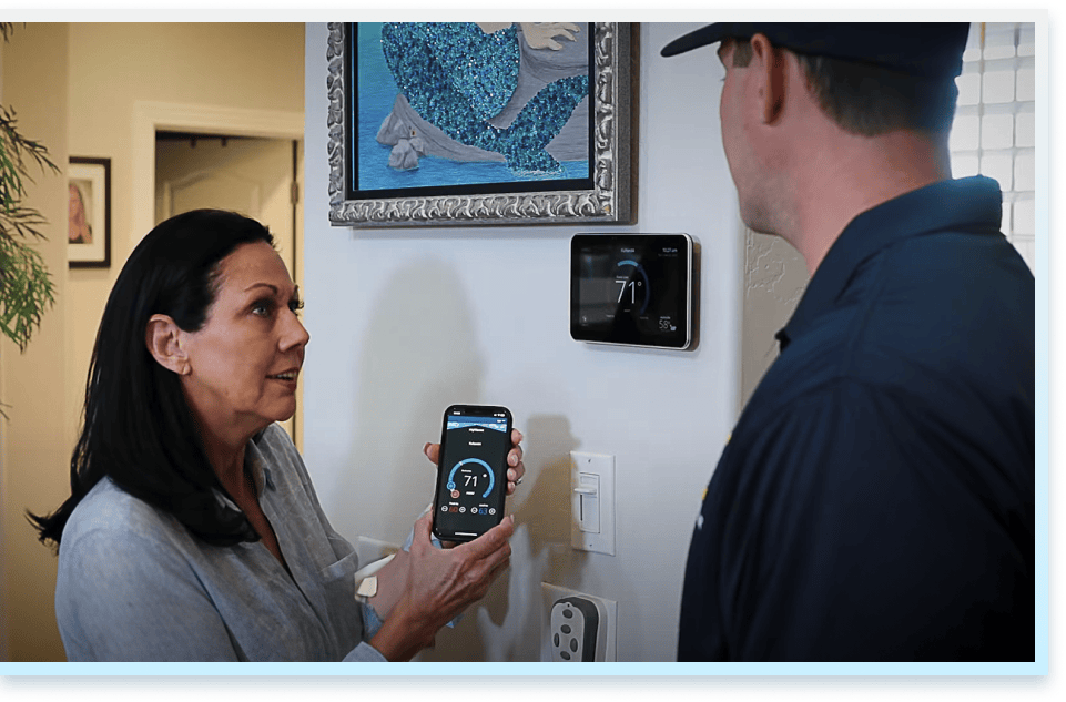 Champion Air servicing an air conditioner