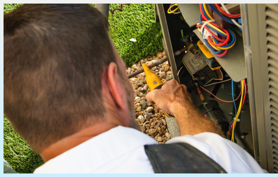 Champion Air servicing an air conditioner