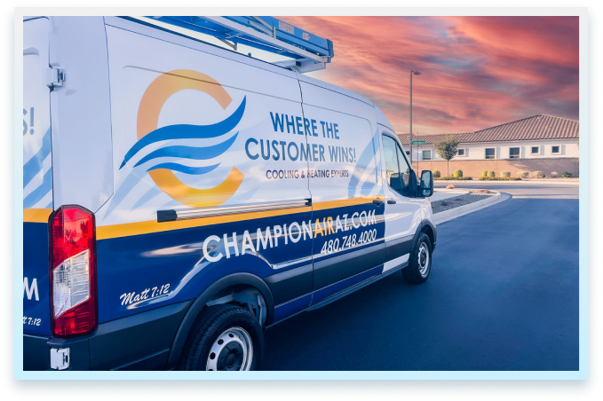 Champion Air service van parked at sunset